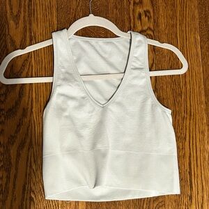 Urban seamless v neck tank top. Never worn. Size M.